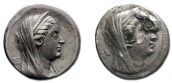 Arsinoe II, regina d\'Egitto: moneta autentica (a sinistra) e esemplare suberato (a destra)